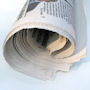 Sydney Morning Herald Detail from a photograph of a rolled-up newspaper