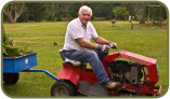 Man on tractor - photo by Yvonne Lorenzi
