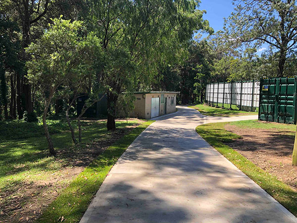 concrete path with amenities building