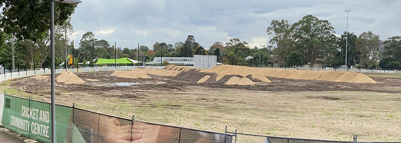 oval with mound of sand on top
