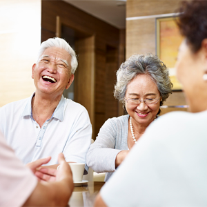 senior asian people getting together and having a good time