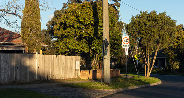 suburban street corner with 40kmh sign