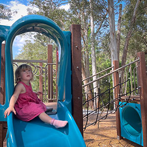 child on play equipment