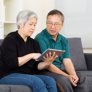 Korean couple on ipad