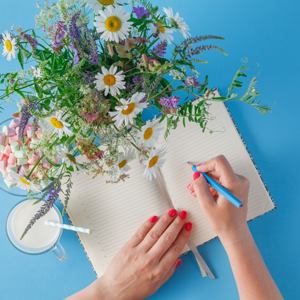 flowers and writing pen and paper
