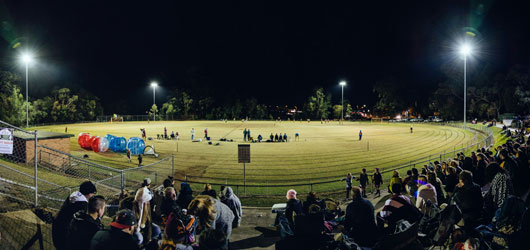 sportsground under lights at night