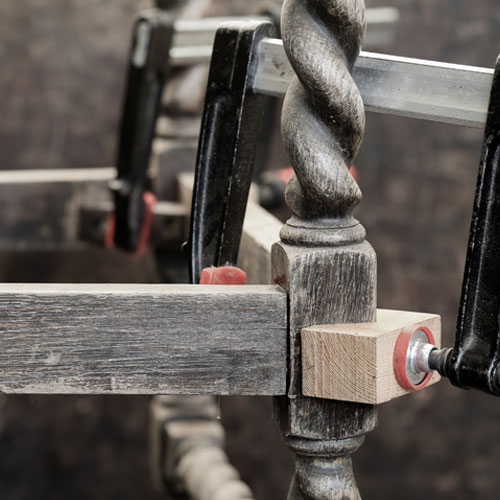 antique chair clamped together