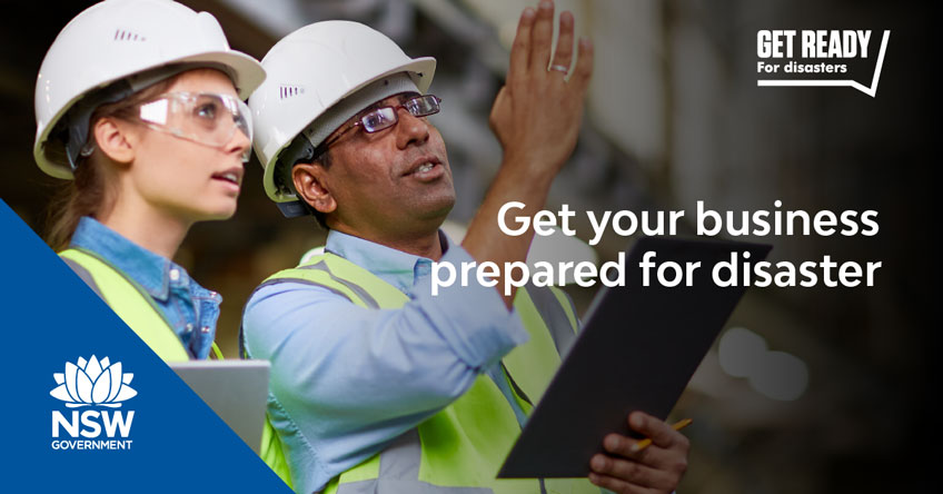 Workers in safety hats and glasses