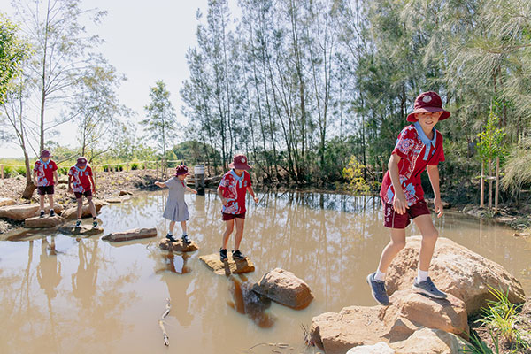 children playing on rocks