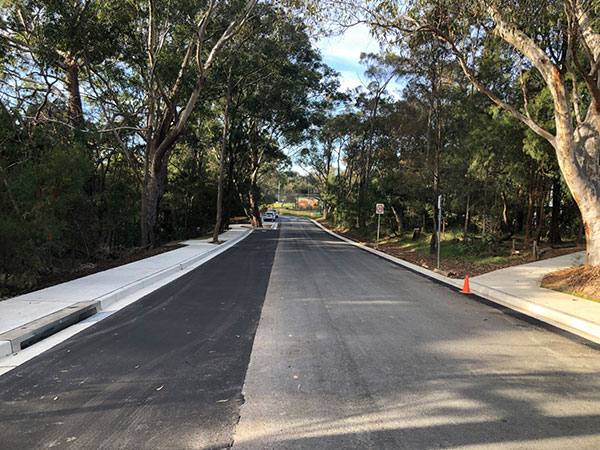 concrete path alongside road