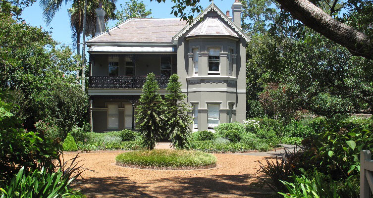 old stylish house with landscaped garden