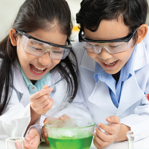 young scientists performing experiment