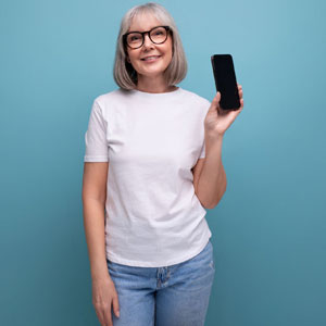 lady holding iphone with blue background