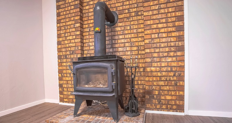 heater radiator on yellow wall in house