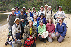 Group in front of estuary beach