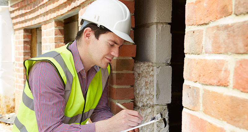 rchitect Checking Insulation During House Construction